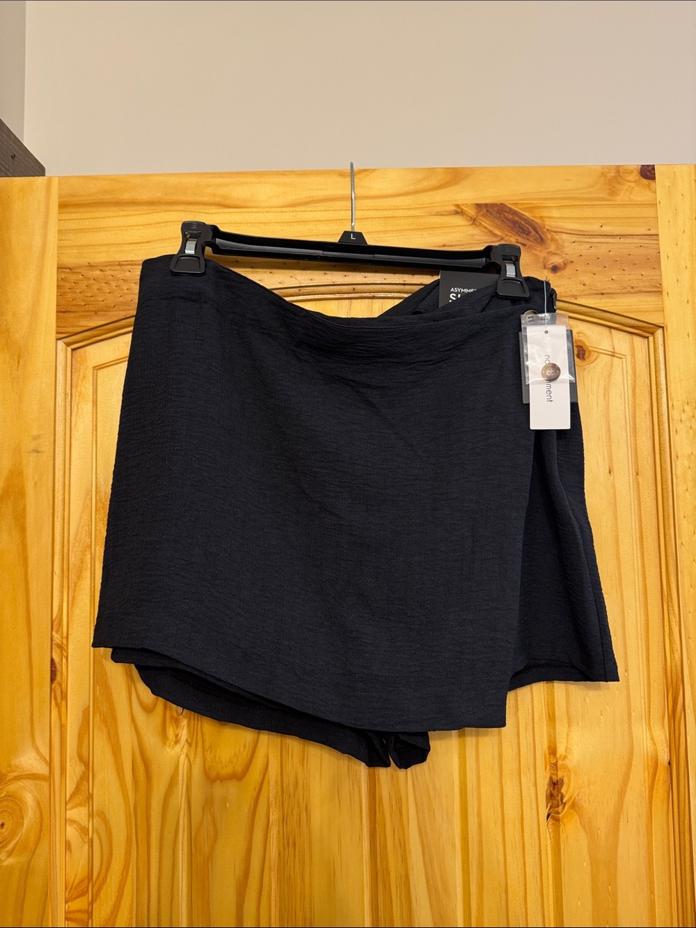 No comment asymmetrical black skort large